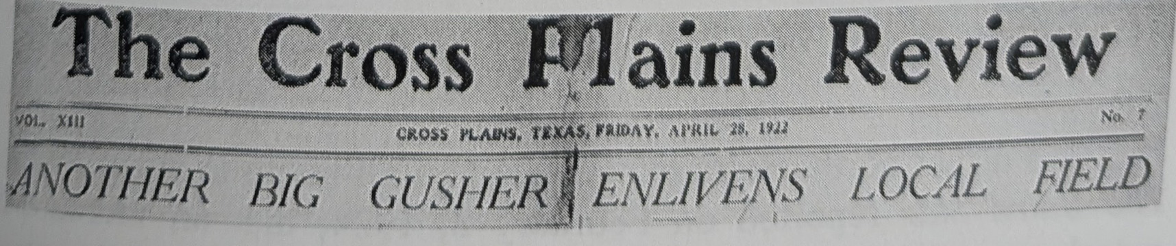 A newspaper nameplate clipping reading The Cross Plains Review, dated Cross Plains, Texas, Friday, April 28, 1922, above a full-width banner headline in spaced capitals: ANOTHER BIG GUSHER ENLIVENS LOCAL FIELD.